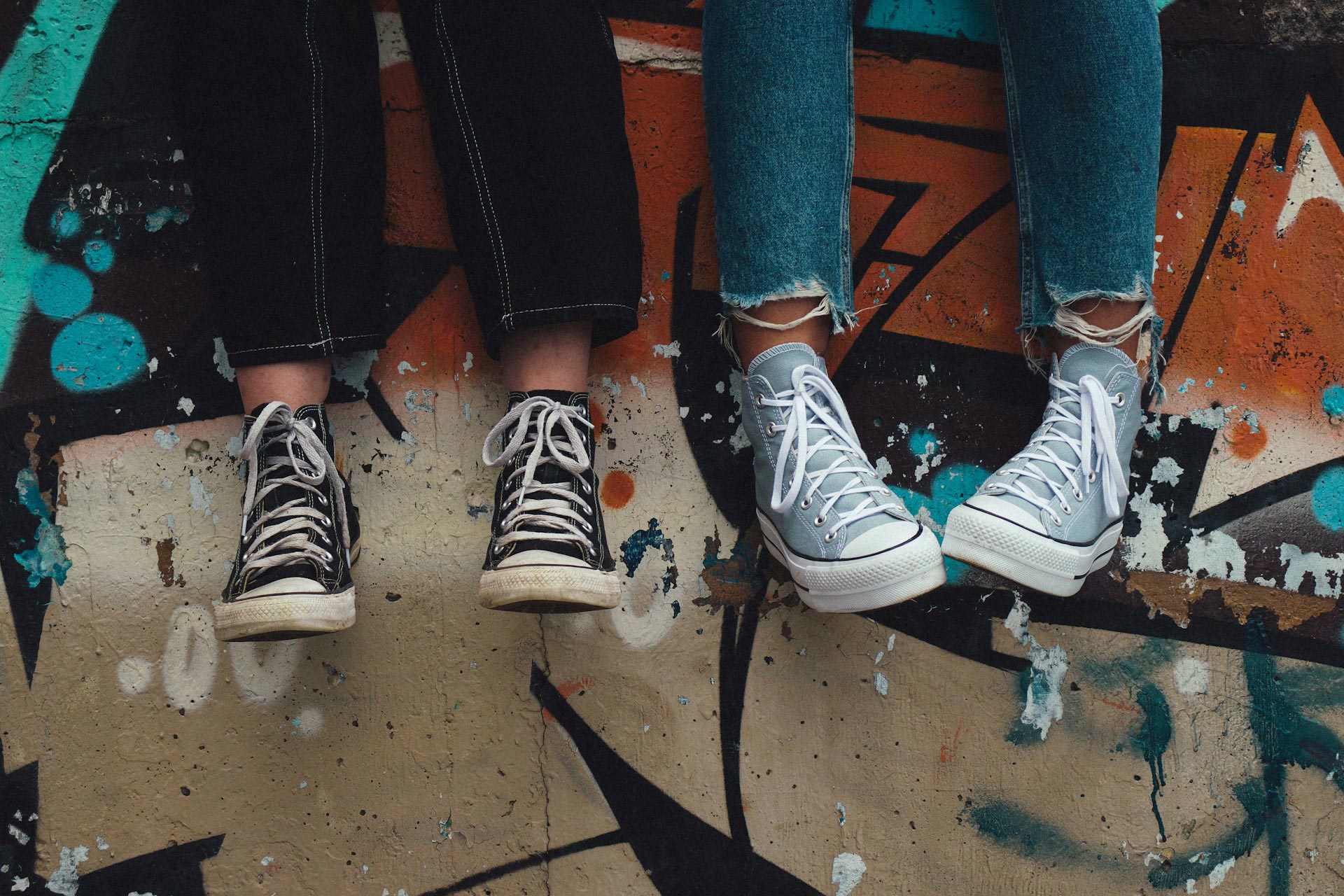 sneakers-on-graffiti-wall